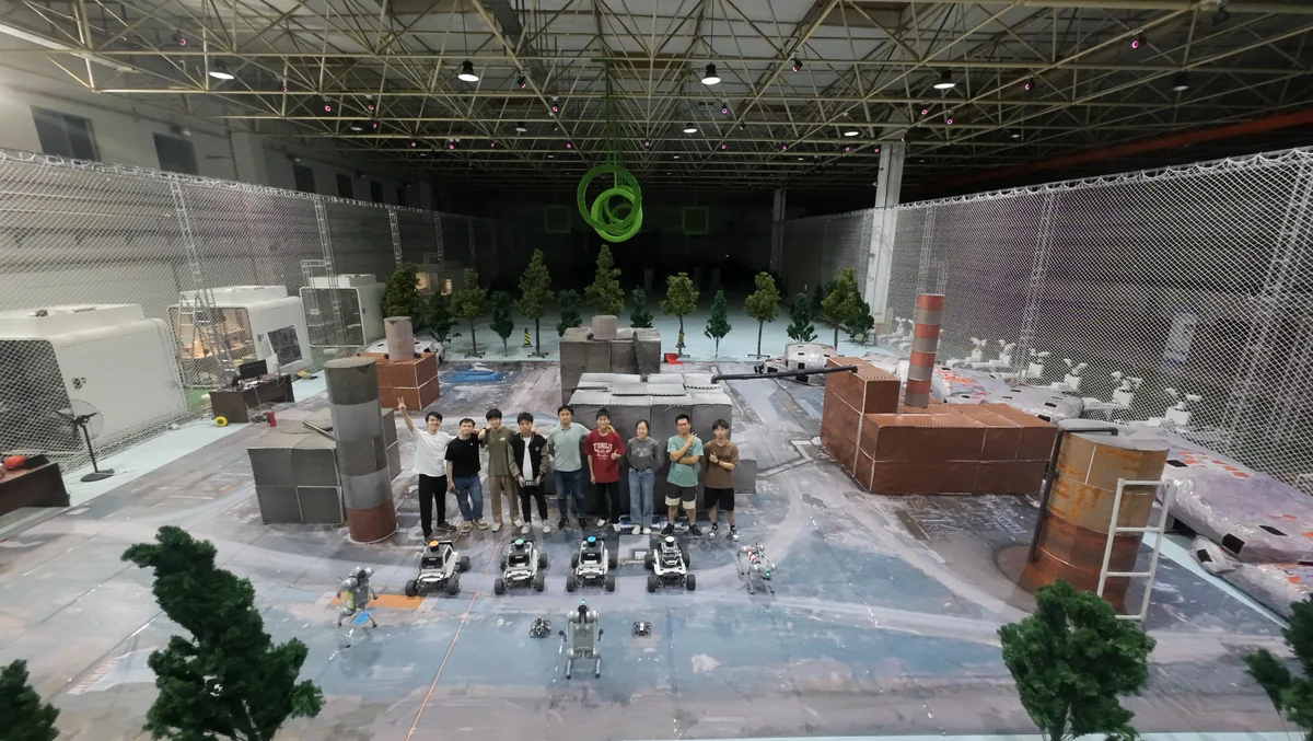 Research team and mobile robots in a large indoor human-swarm collaboration experiment